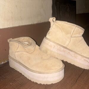 sand platform uggs size ten.